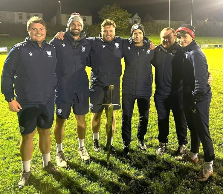 Aled (third left) with his coaching staff